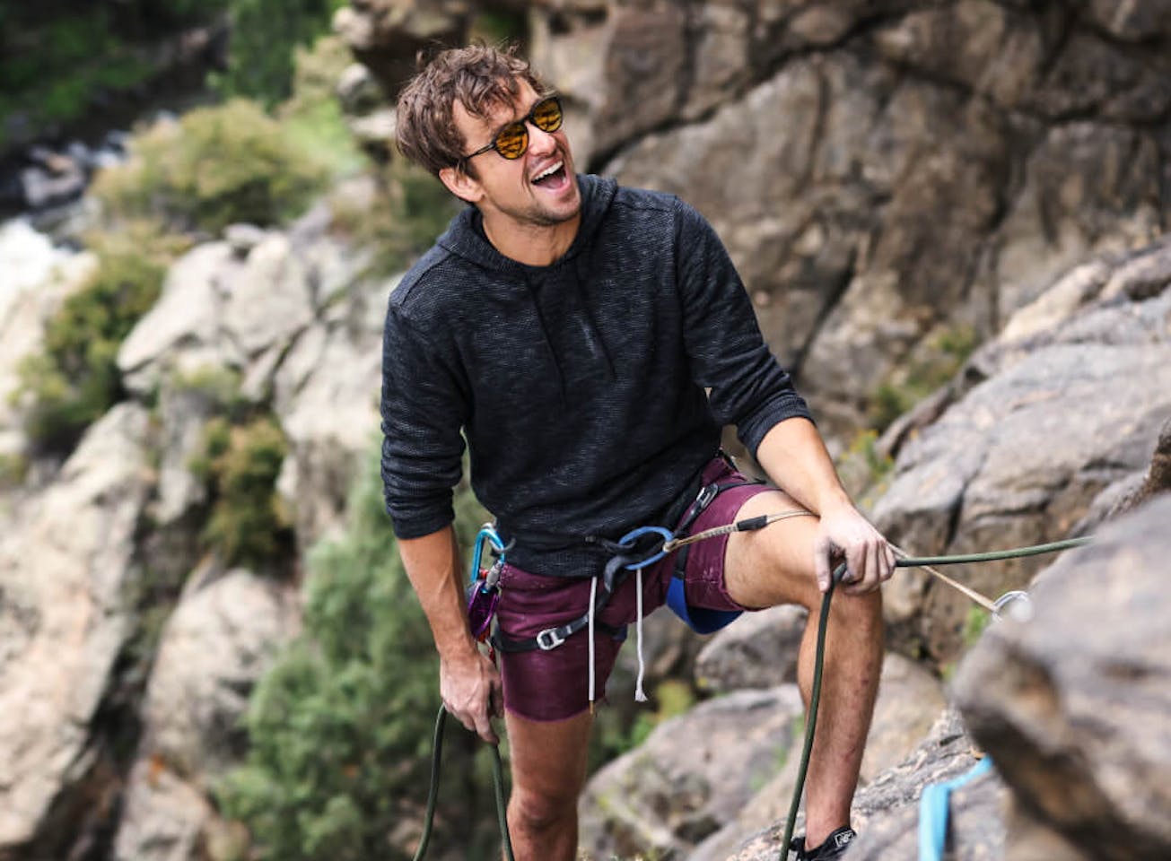 Man in rock climbing gear and Oslo Sunglasses