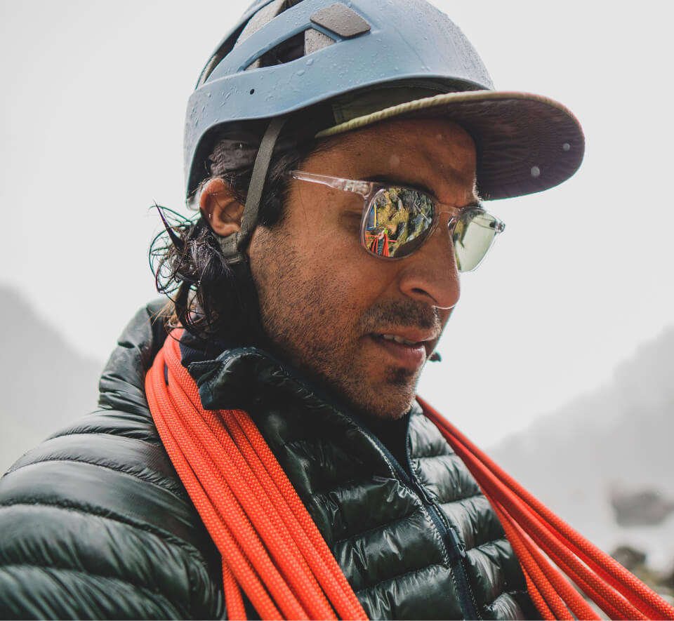 Man with climbing rope and Hunter sunglasses