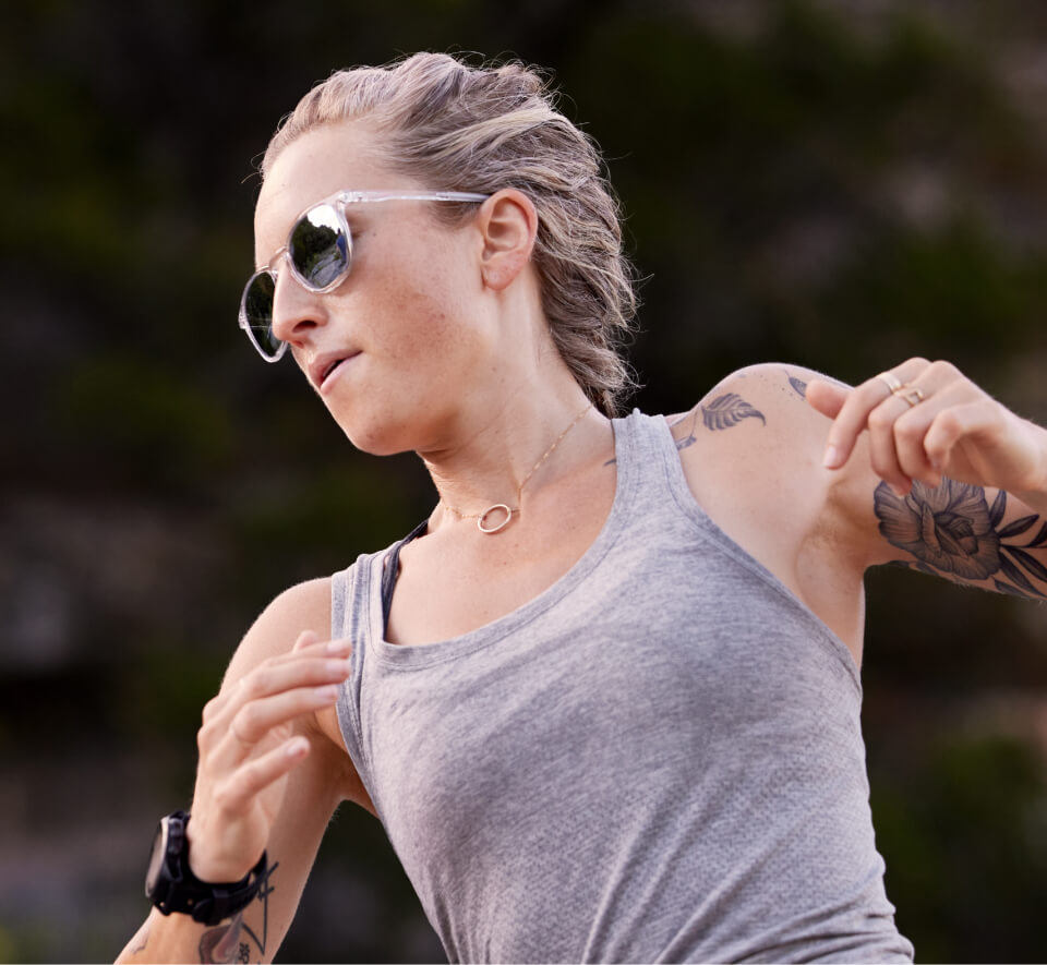 Woman running in Hunter sunglasses