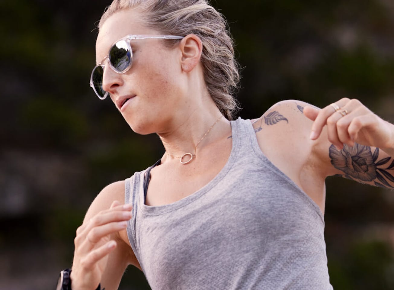 Woman running in Hunter sunglasses