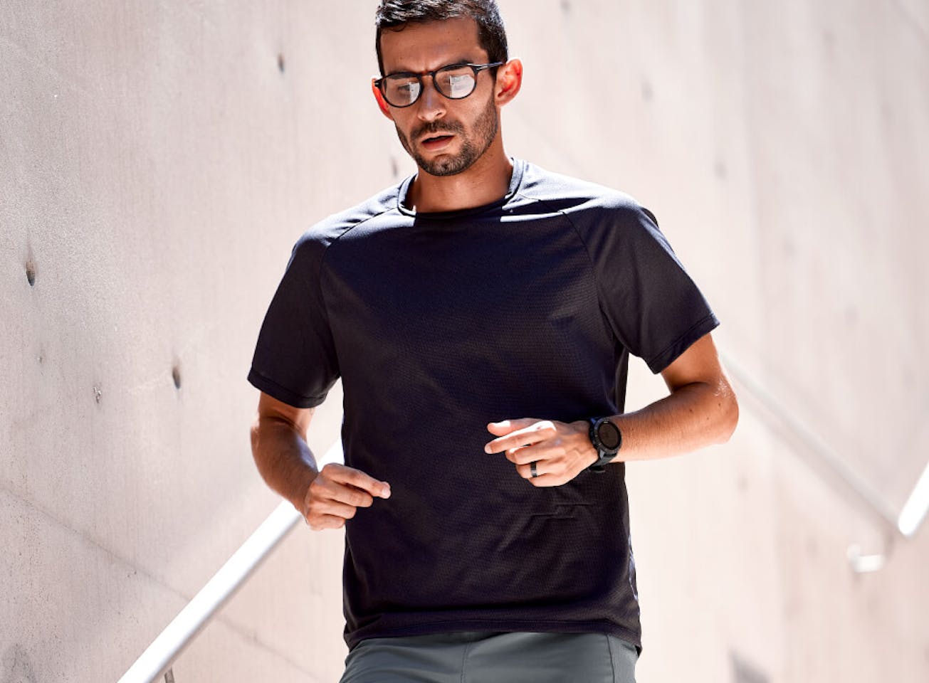 Man jogging down stairs