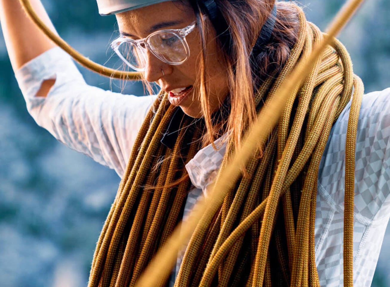 Woman organizing climbing rope in Oslo Eyeglasses