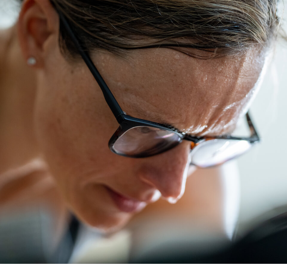 Woman working out and sweating wearing Rory eyeglasses
