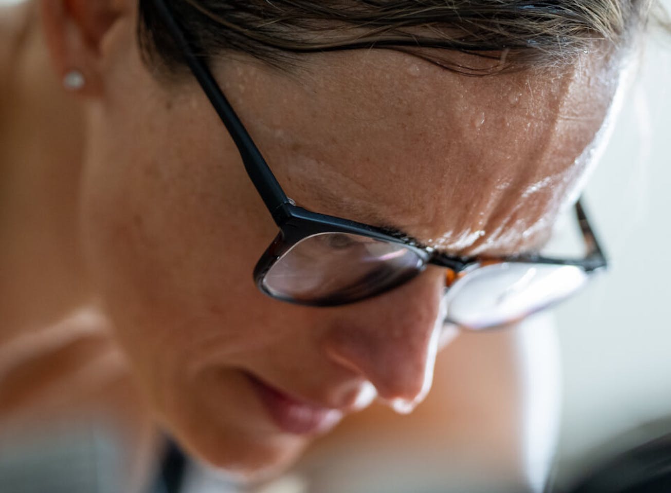 Woman working out and sweating wearing Rory eyeglasses