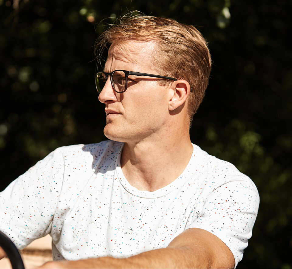 Man in white shirt working out in Rory eyeglasses