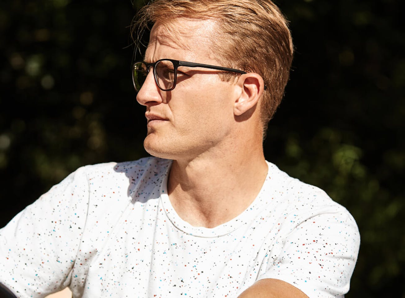 Man in white shirt working out in Rory eyeglasses
