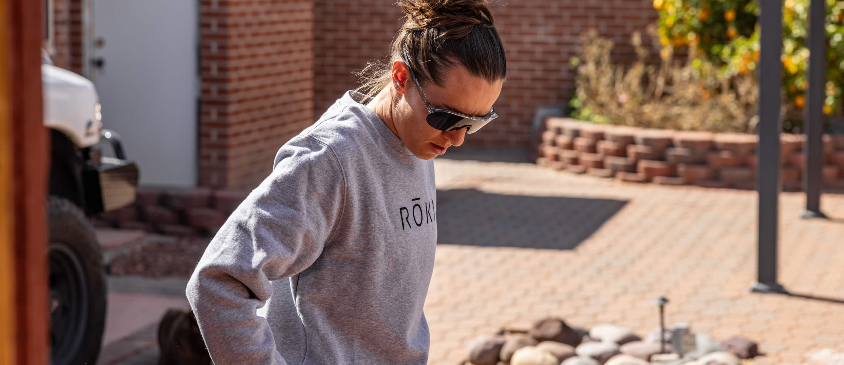 Woman in Grey ROKA Sweatshirt