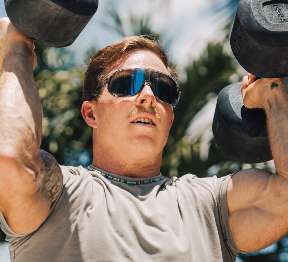 Man lifting dumbells in San Remo Sunglasses