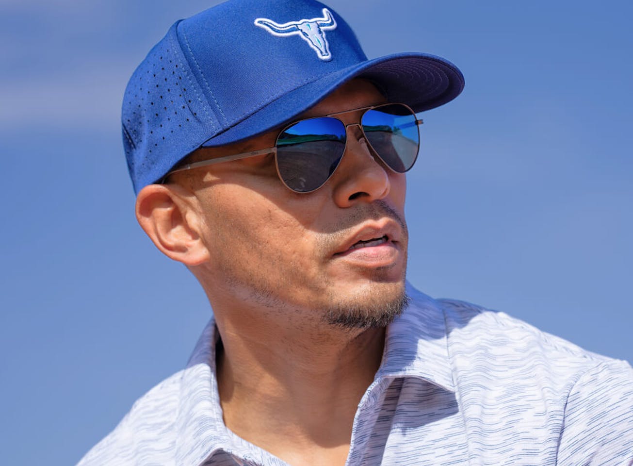 Man in blue hat and Phantom sunglasses