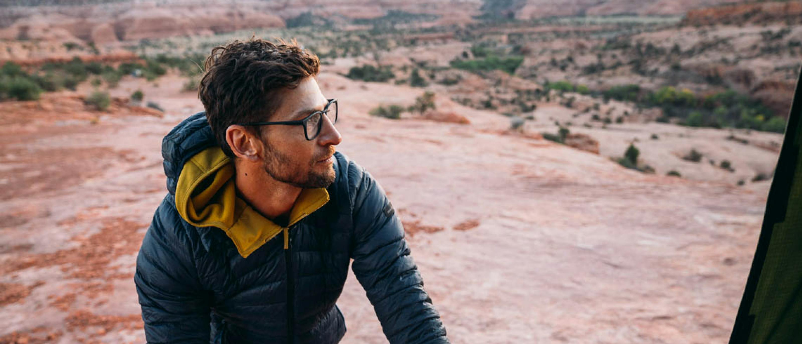 Man in Rory eyeglasses outside in desert