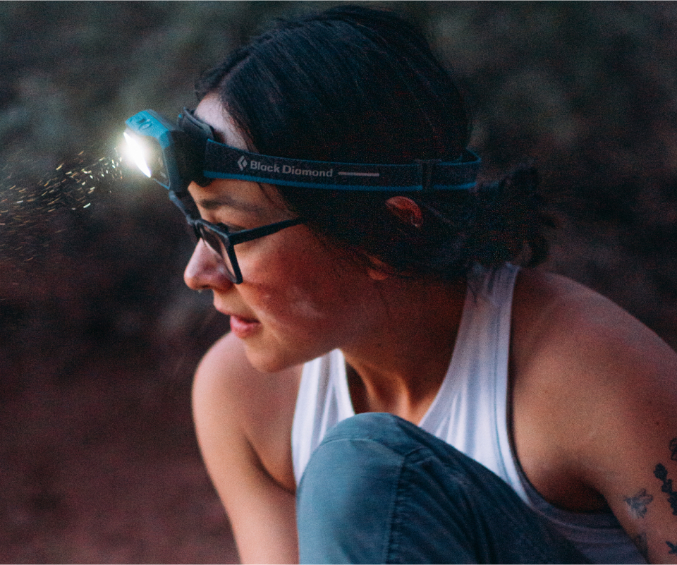 woman in Rory eyeglasses and headlamp