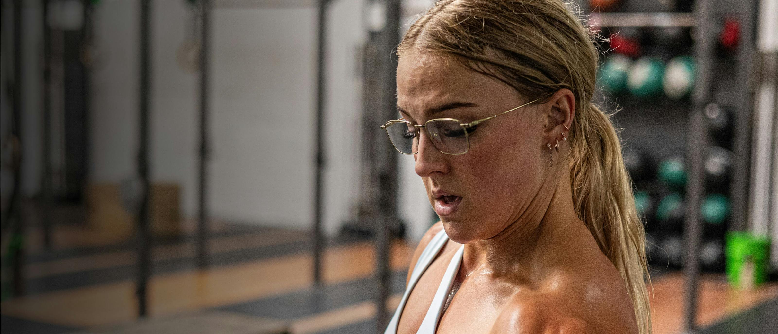 Woman in gym wearing Vapor eyeglasses
