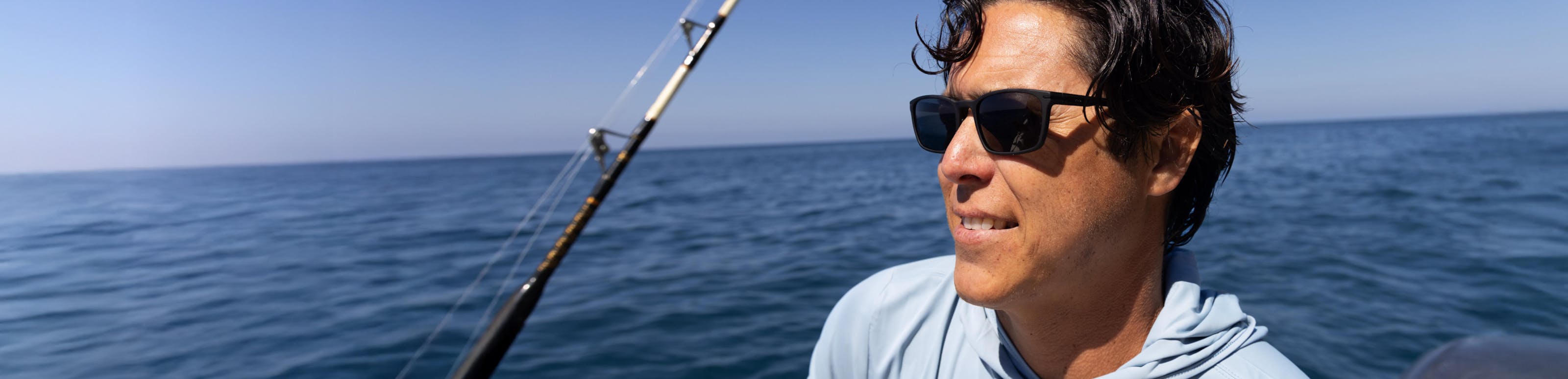 Man at sea wearing Palmer Sunglasses