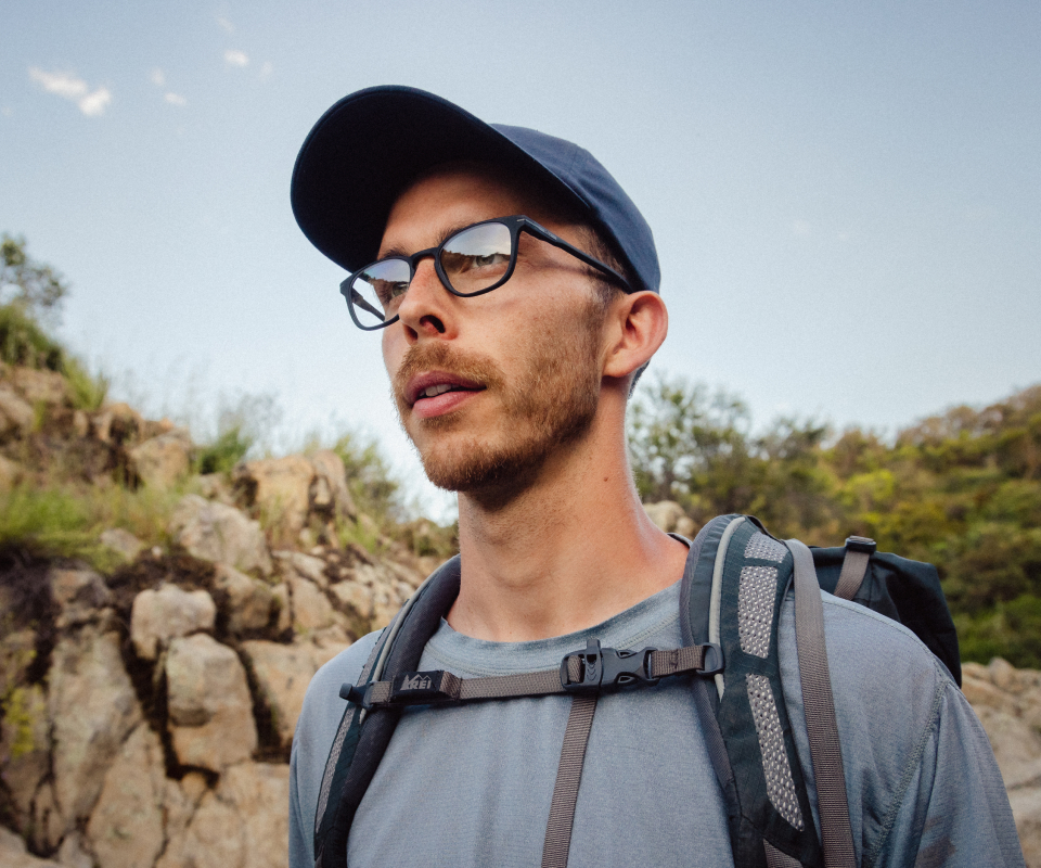 Man hiking wearing Cade eyeglasses