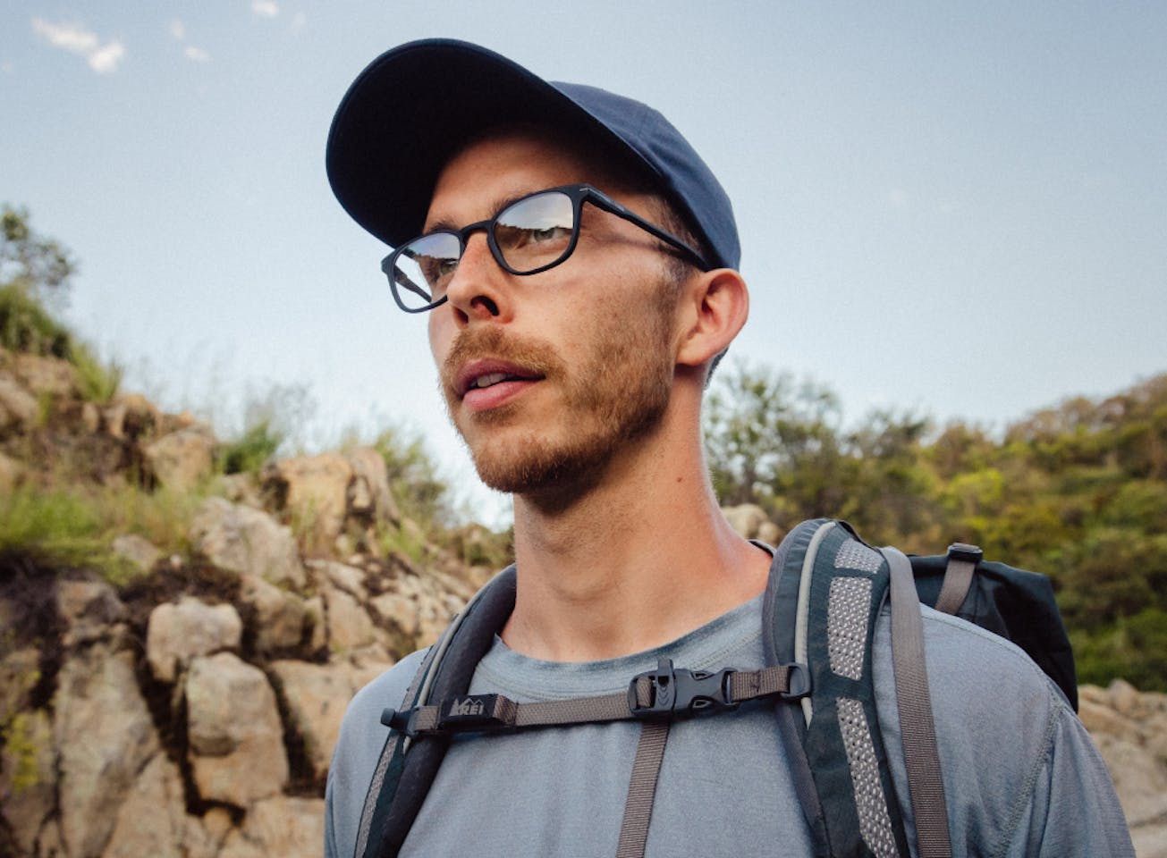 Man hiking wearing Cade eyeglasses