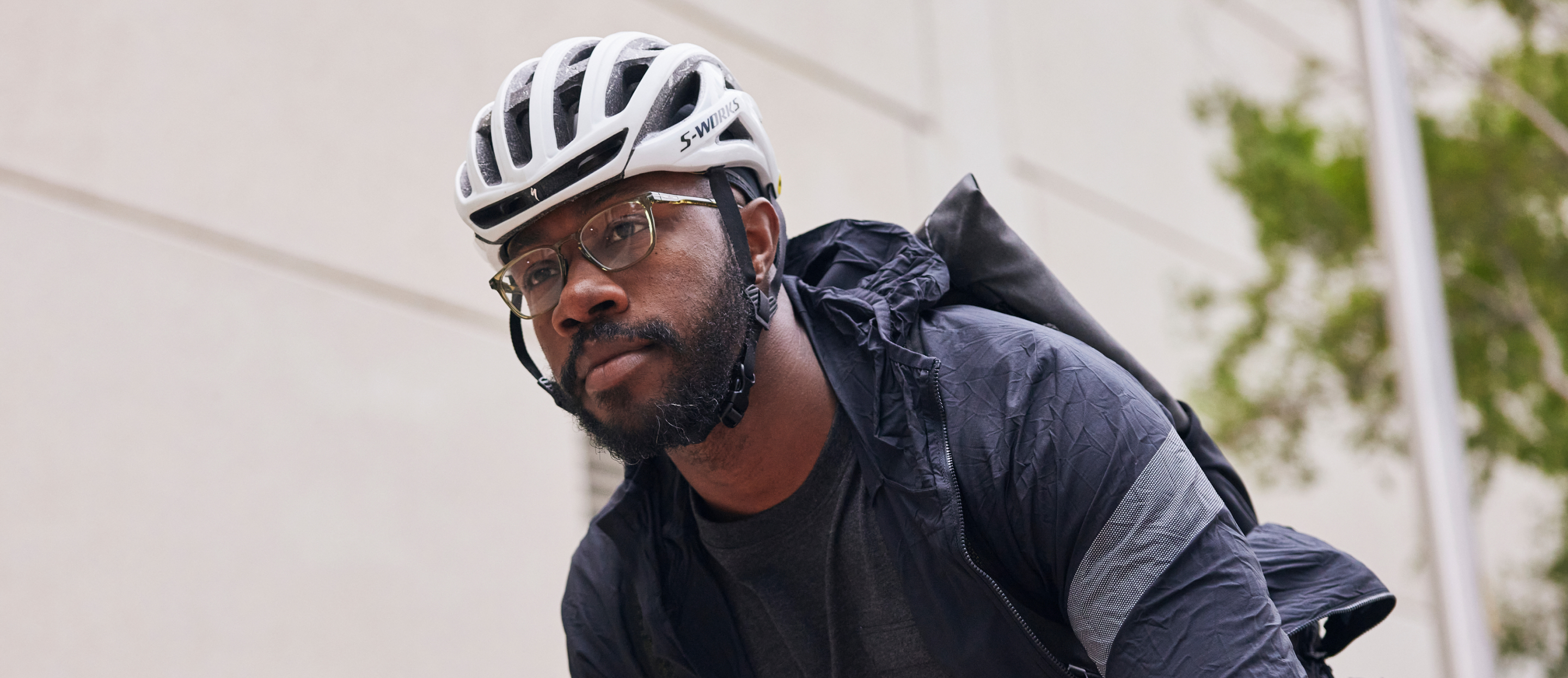 Man biking in Cade eyeglasses