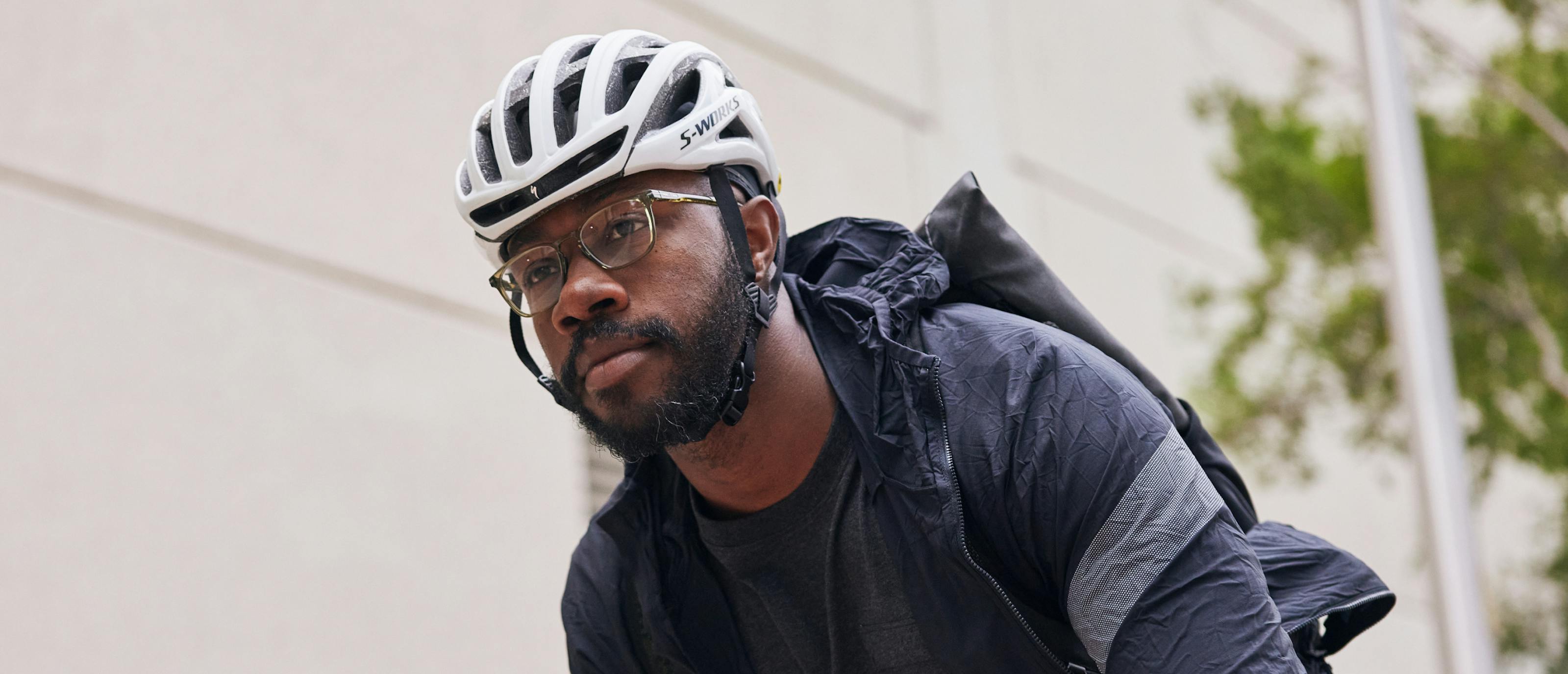 Man biking in Cade eyeglasses