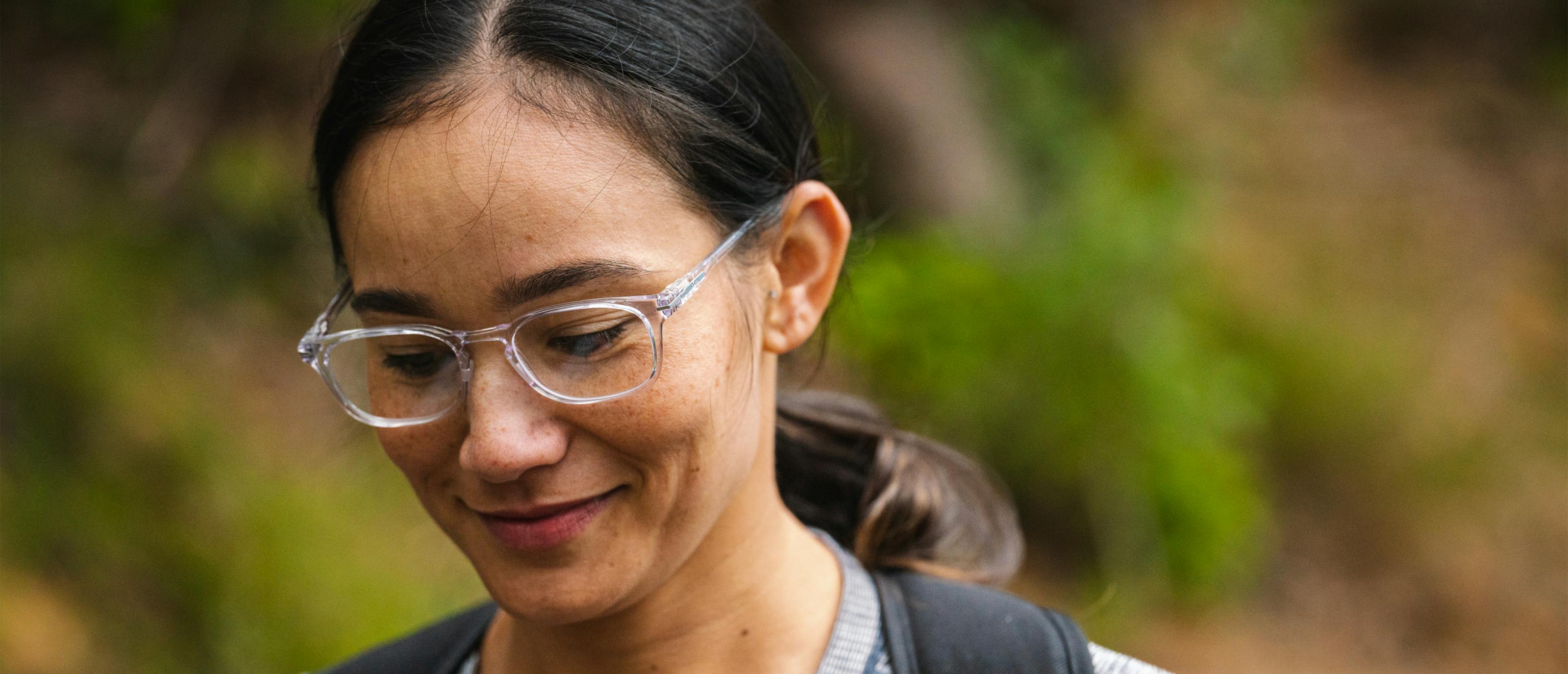 Woman hiking in Cade eyeglasses