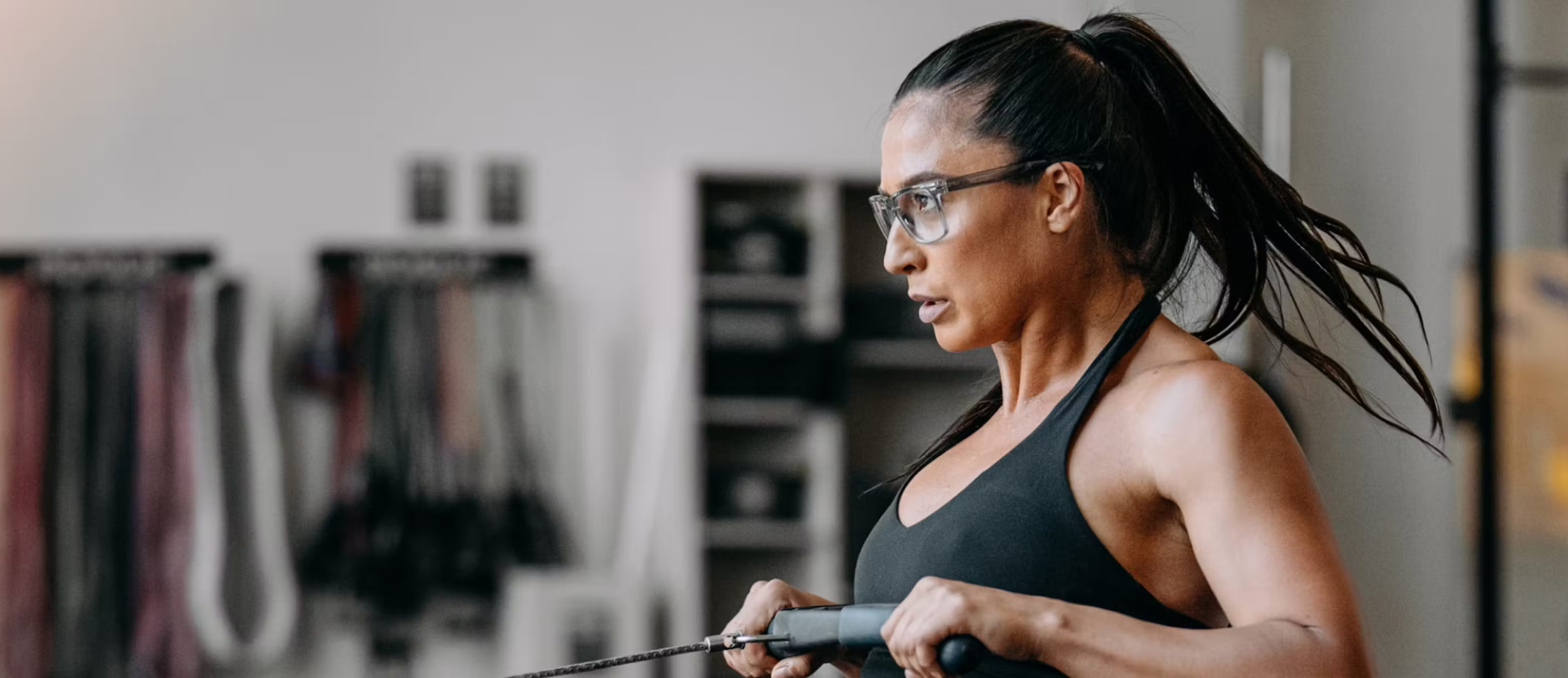 Woman doing rows wearing barton Eyeglasses
