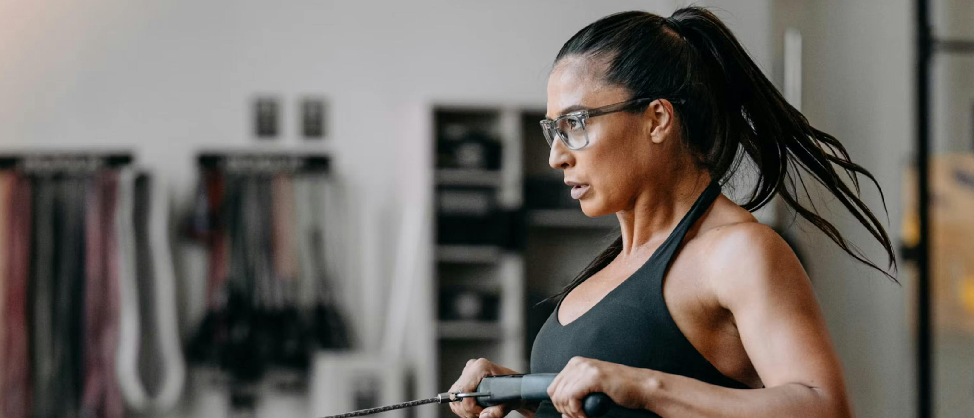 Woman doing rows wearing barton Eyeglasses
