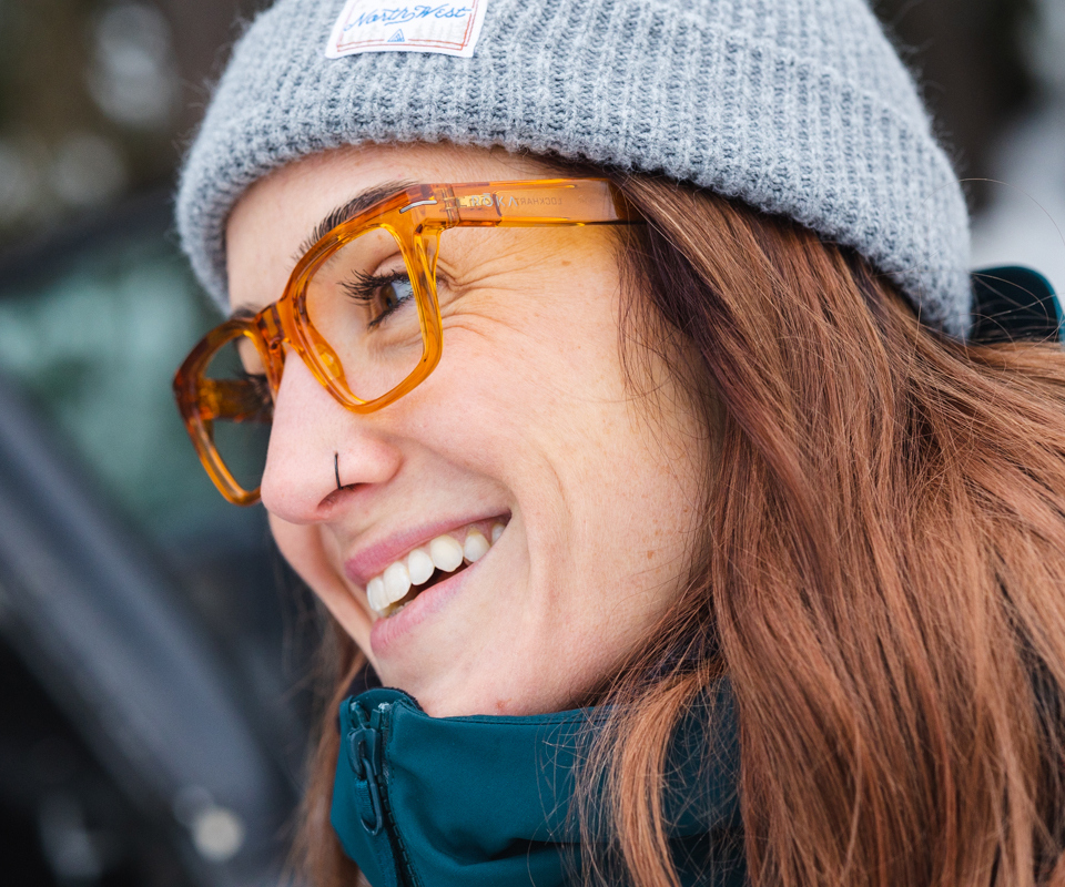 Woman wearing grey beanie and Lockhart eyeglasses