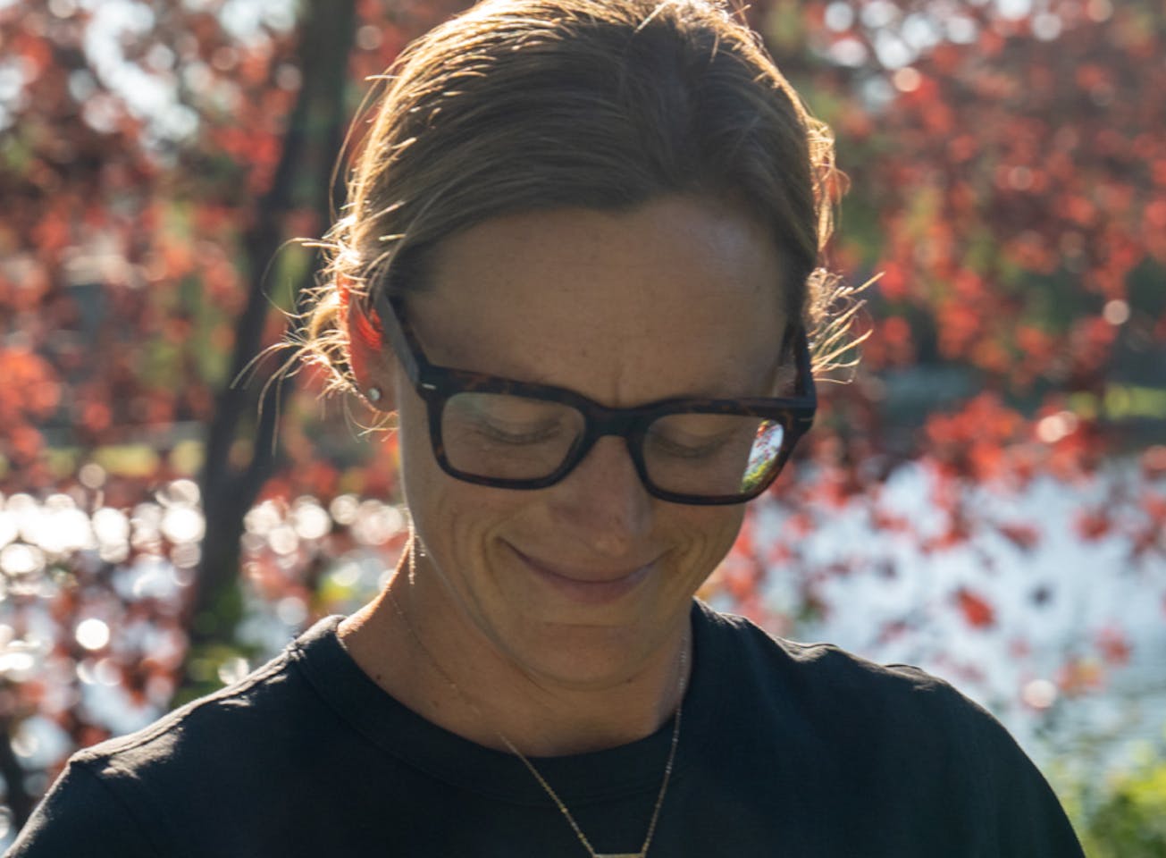 Woman smiling wearing Lockhart eyeglasses