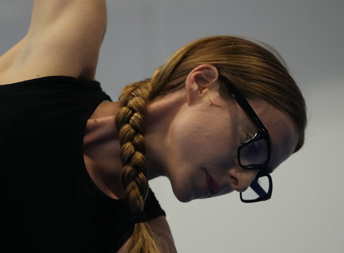 Woman doing yoga wearing Lockhart eyeglasses