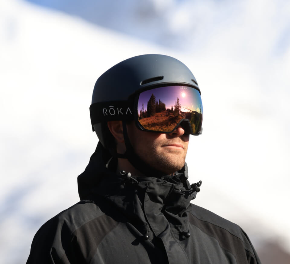 Man wearing Bridger snow goggles