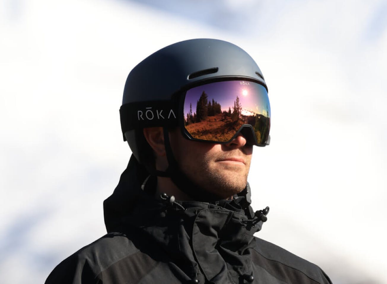Man wearing Bridger snow goggles