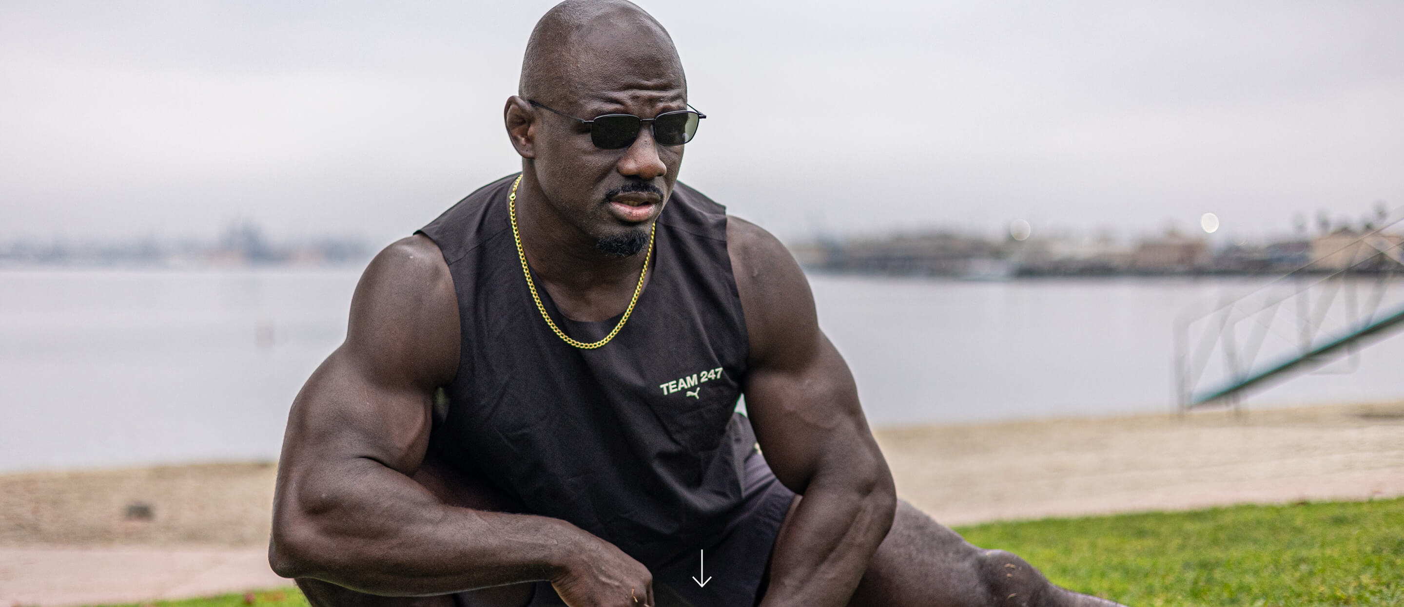 Man in black tank top wearing Vapor sunglasses