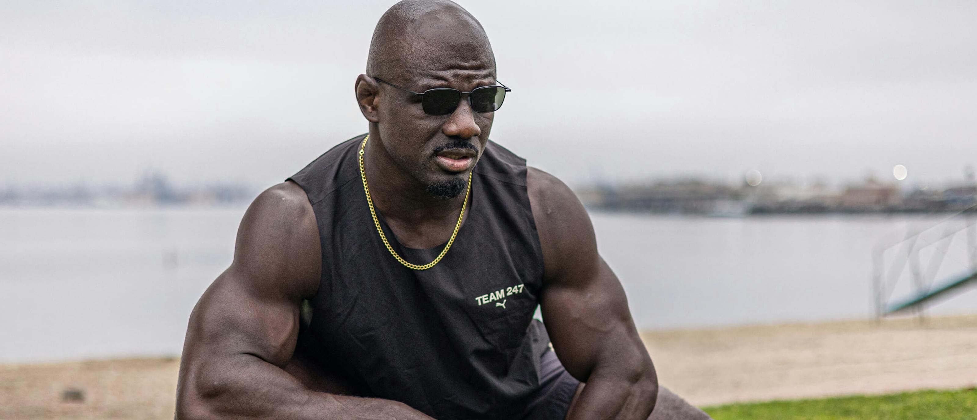 Man in black tank top wearing Vapor sunglasses