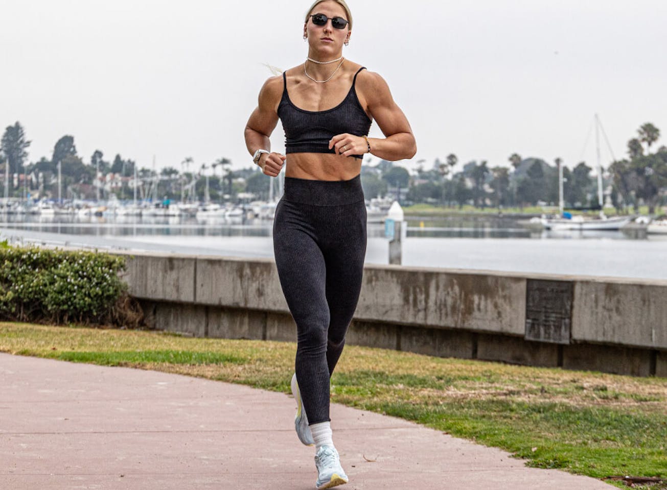 Woman jogging in Vapor sunglasses