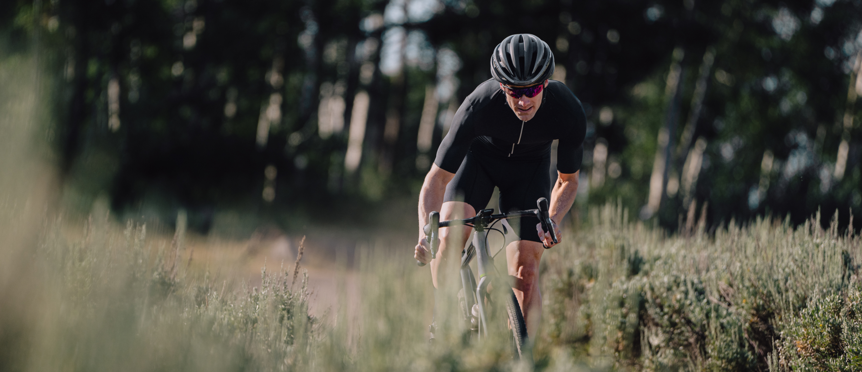 Man in black cycling gear