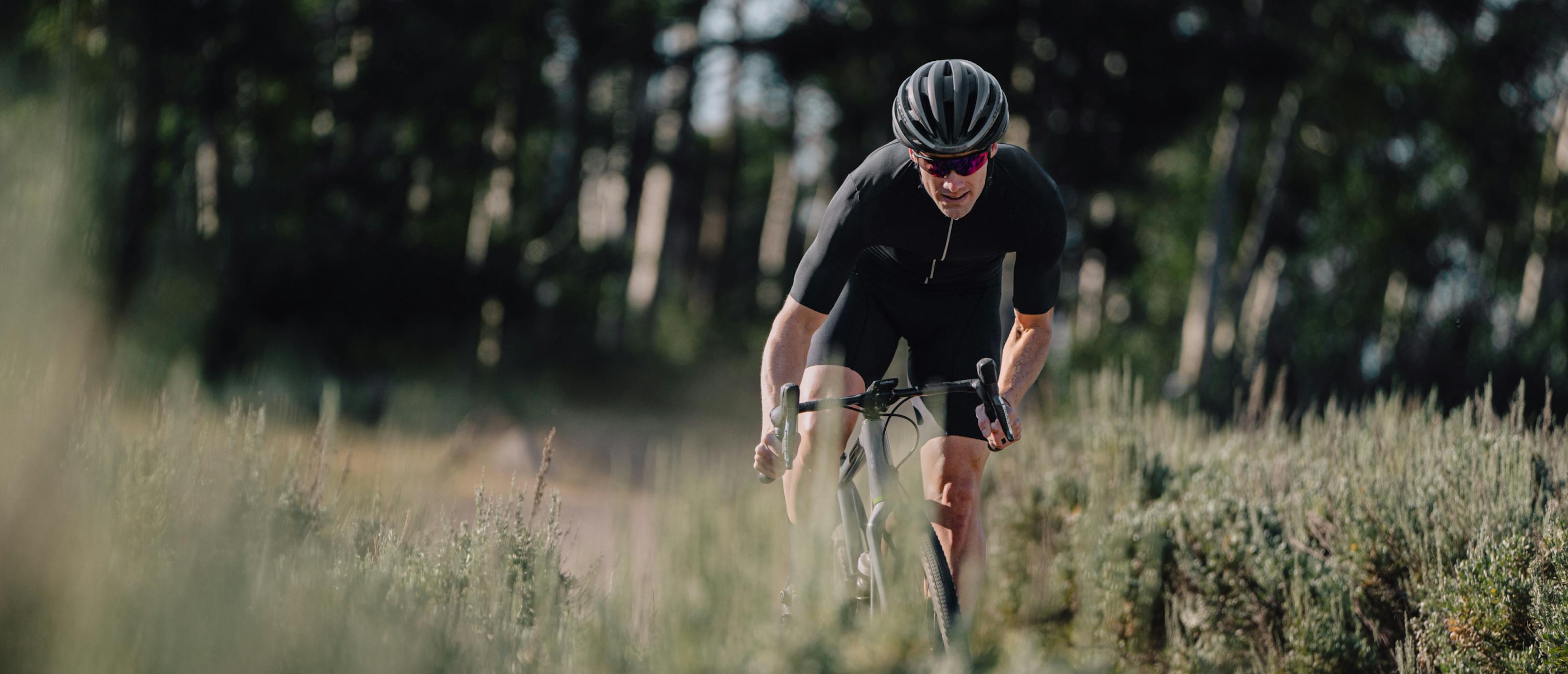 Man in black cycling gear