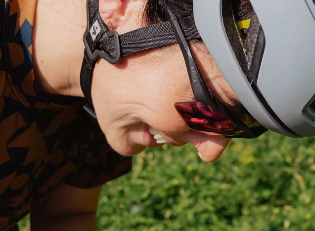 Woman wearing cycling helmet and TL-1 sunglasses