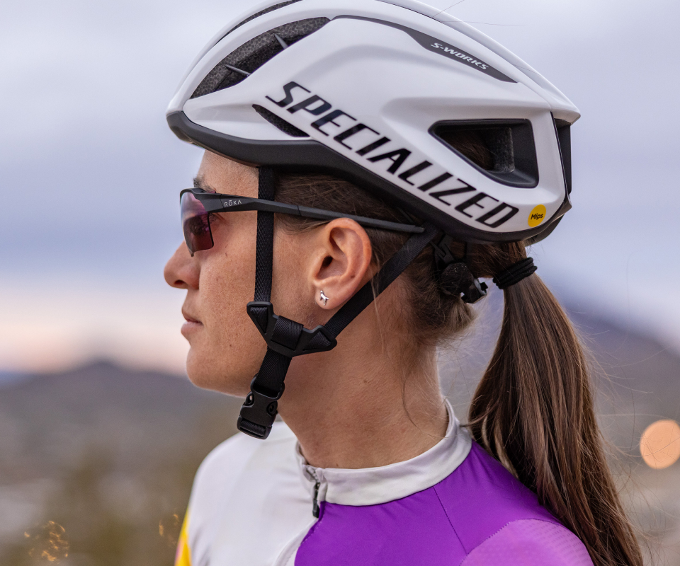 Woman wearing cycling helmet and TL-1 sunglasses