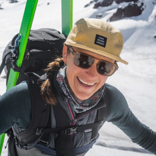 Woman hiking in snow in Estacado Sunglasses