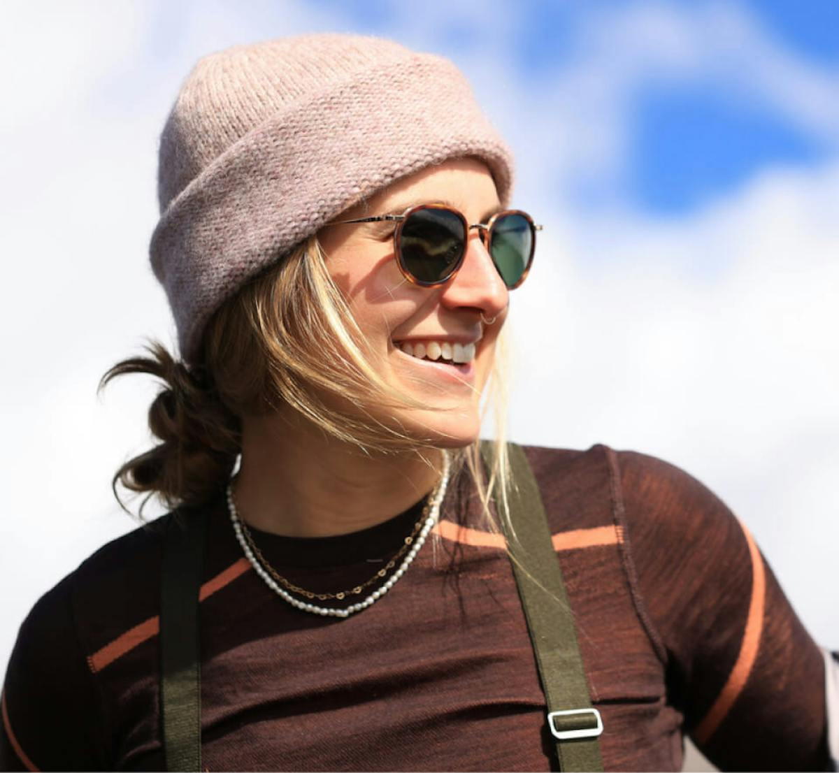 Woman smiling wearing Alto Fusion sunglasses