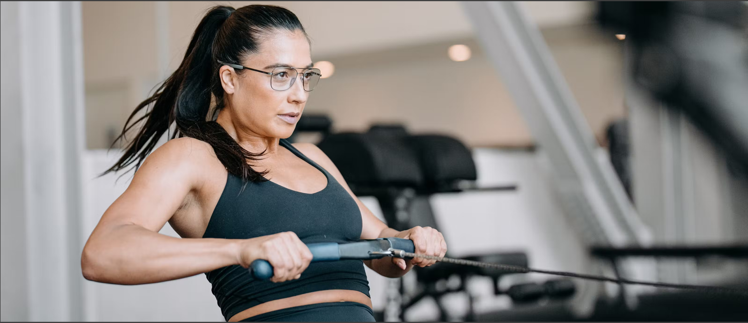 Woman on rowing machine