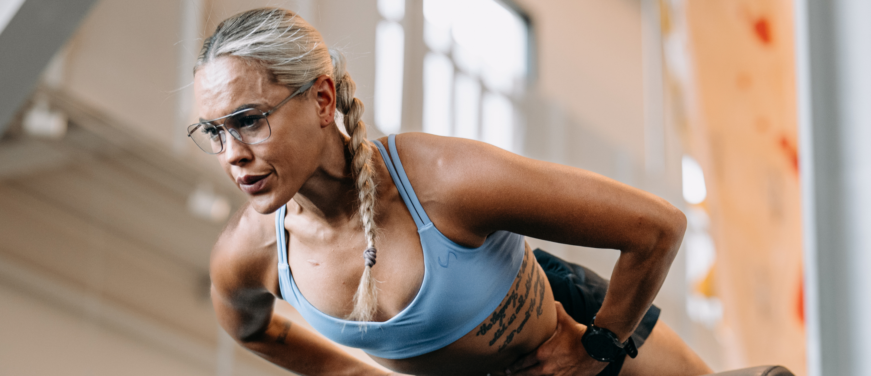 Woman stretching in Falcon Eyeglasses