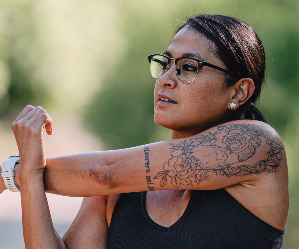 Woman stretching wearing Cambridge Eyeglasses