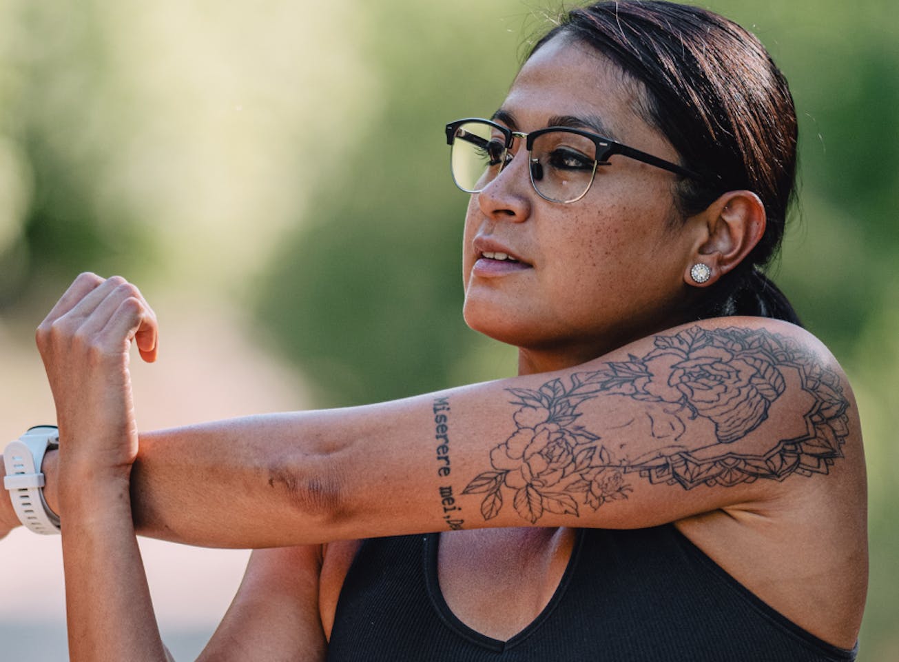 Woman stretching wearing Cambridge Eyeglasses