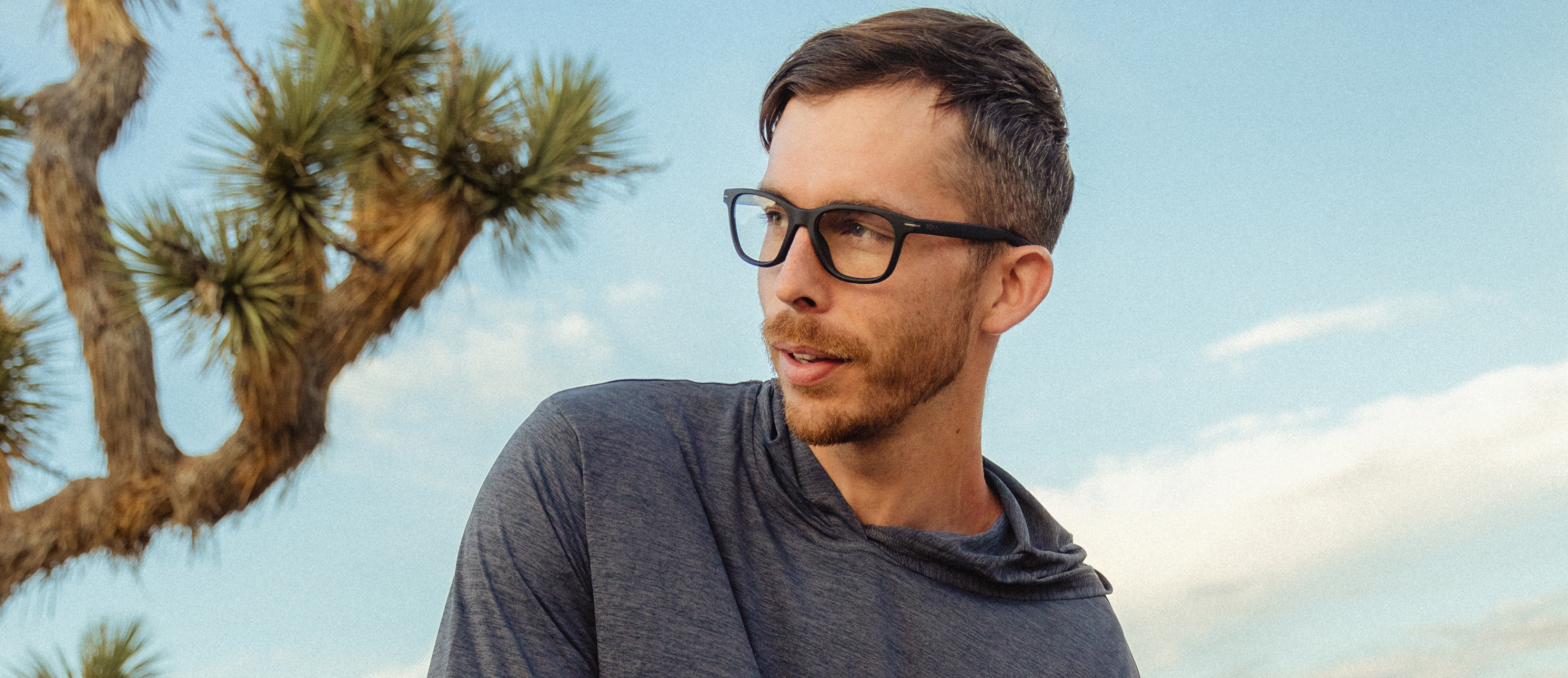 Man in desert wearing Zilker eyeglasses
