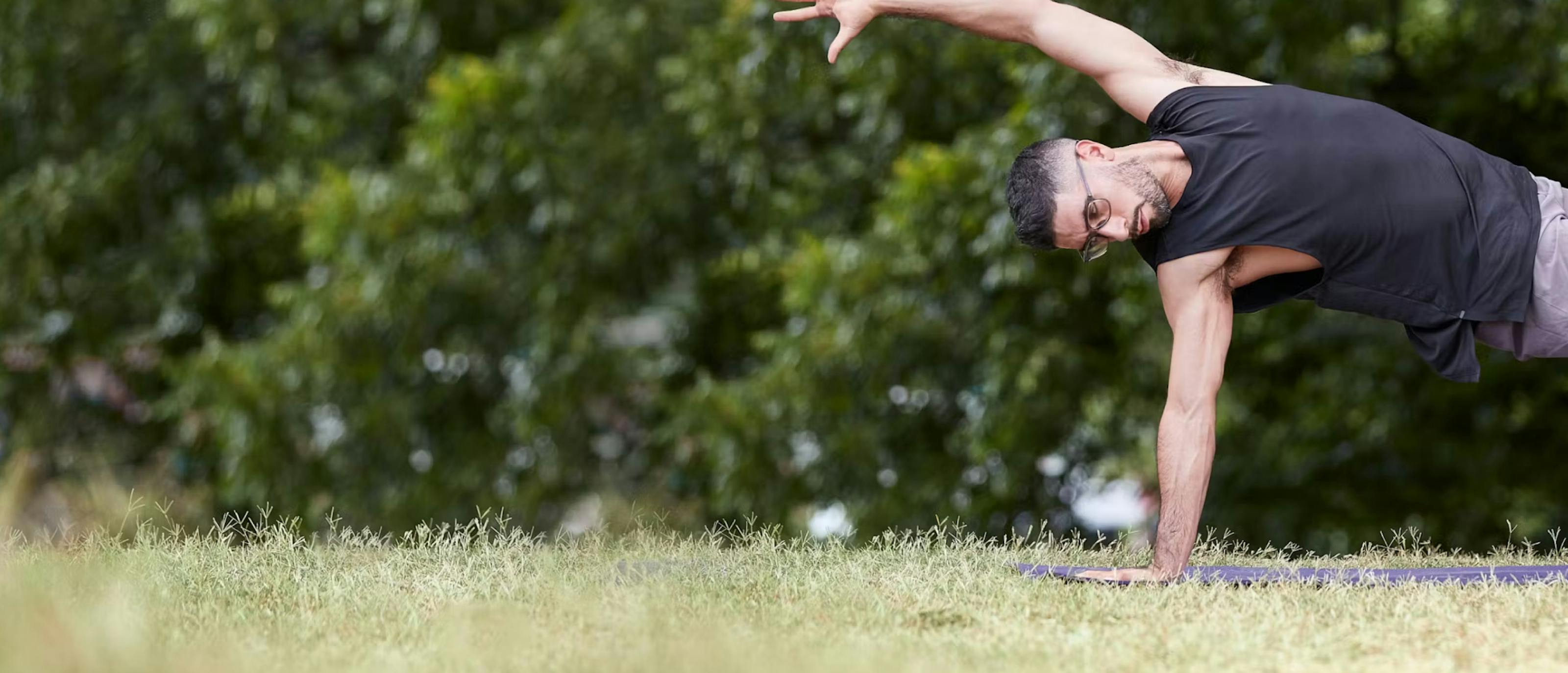 Man doing Yoga in Zilker eyeglasses