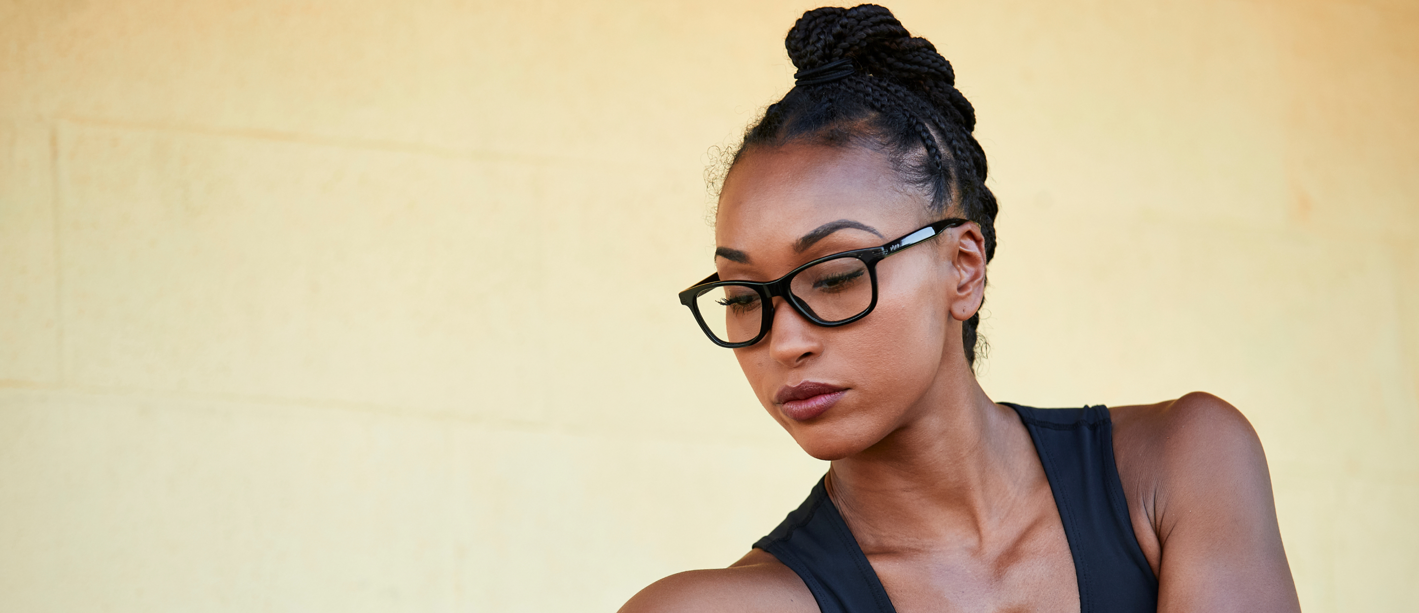 Woman wearing Zilker eyeglasses