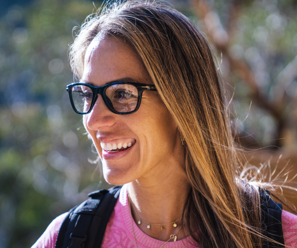 Woman smiling wearing Zilker eyeglasses