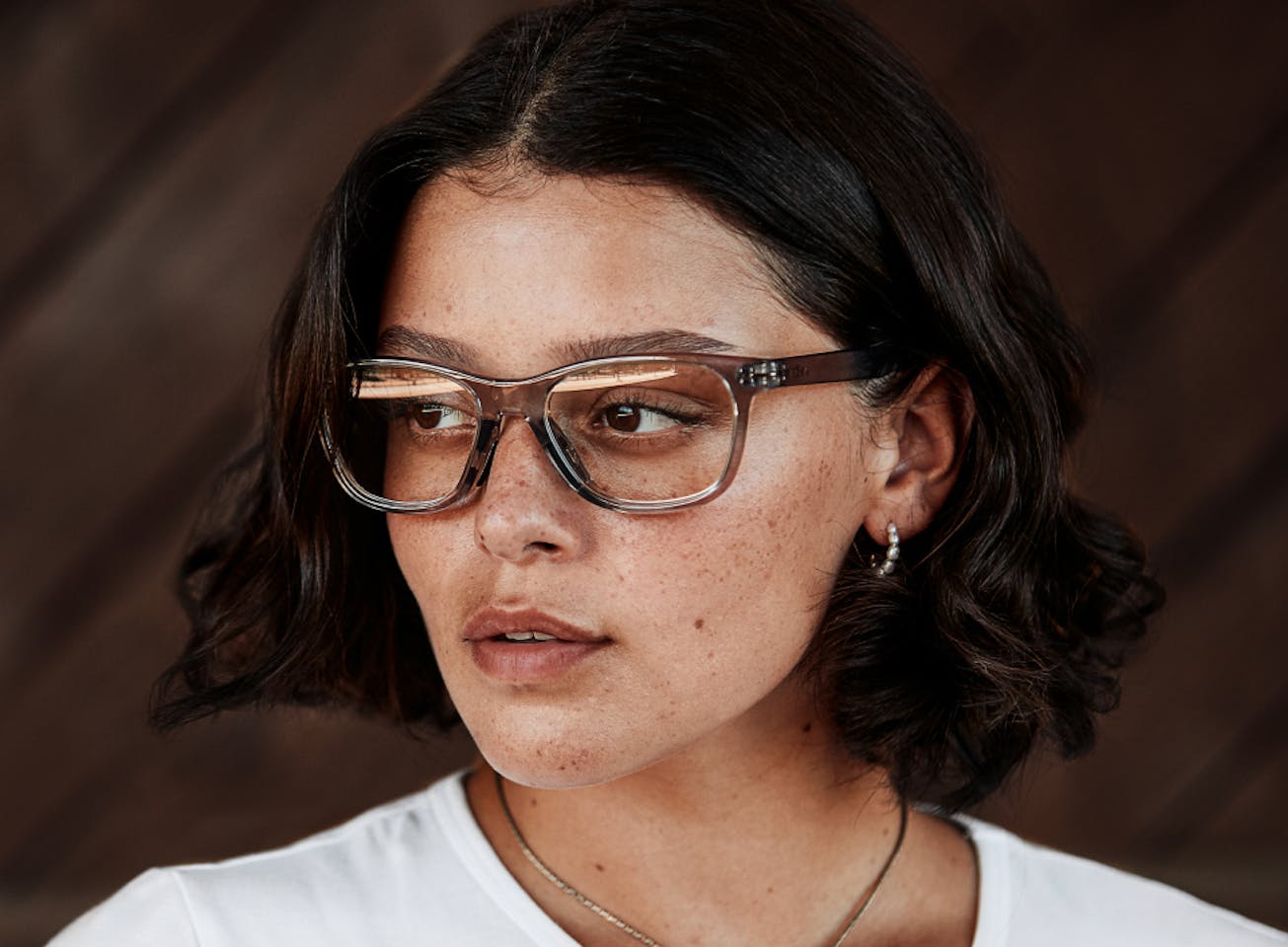 Woman wearing Zilker eyeglasses