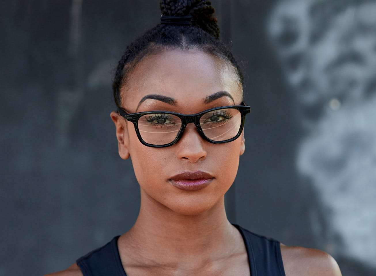Woman wearing Zilker eyeglasses
