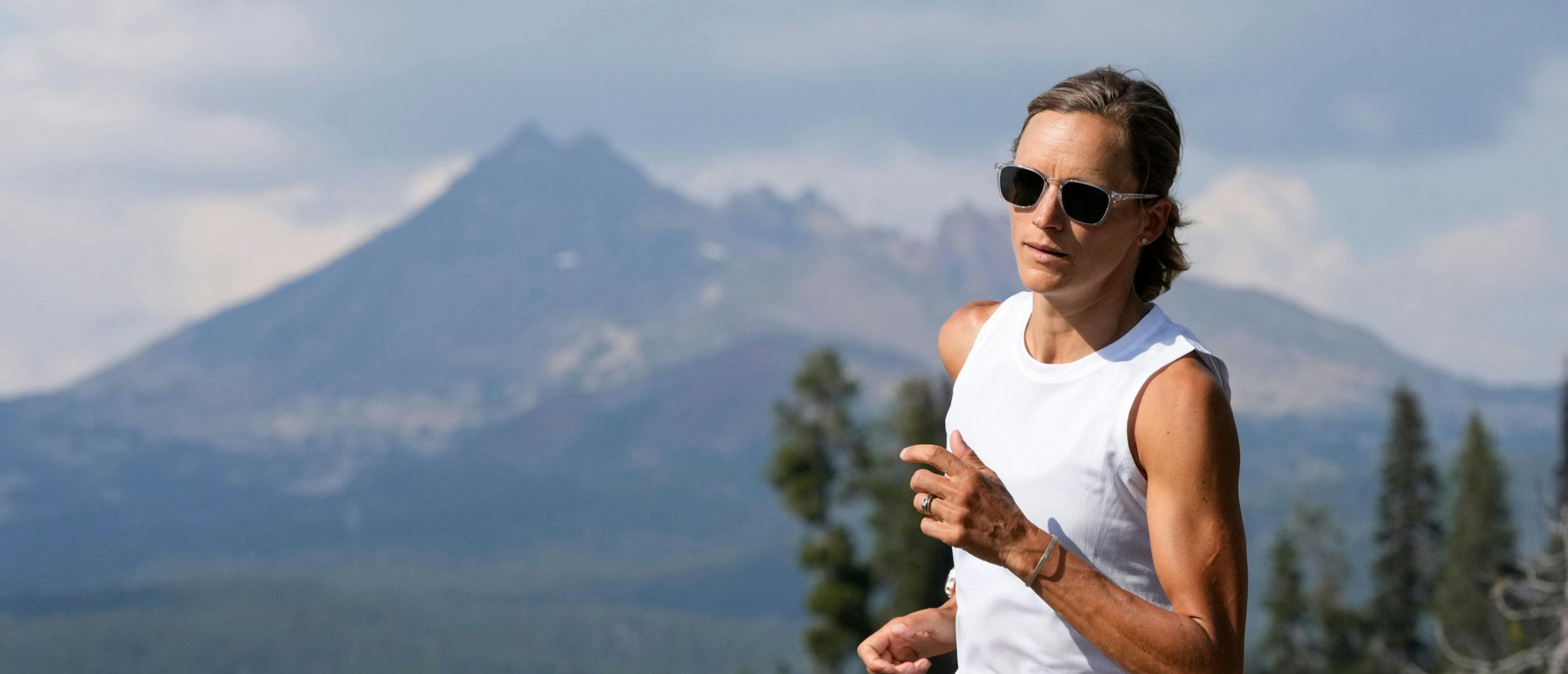 Woman jogging wearing Cade Sunglasses