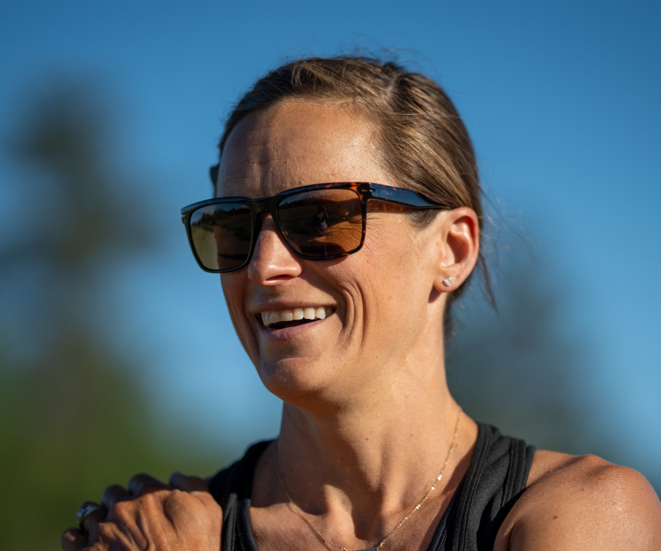 Woman smiling wearing Barton sunglasses